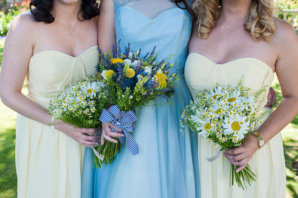 A pretty pale blue wedding dress for a nautical inspired Summer wedding by the sea. Photography by Alexandria Hall.