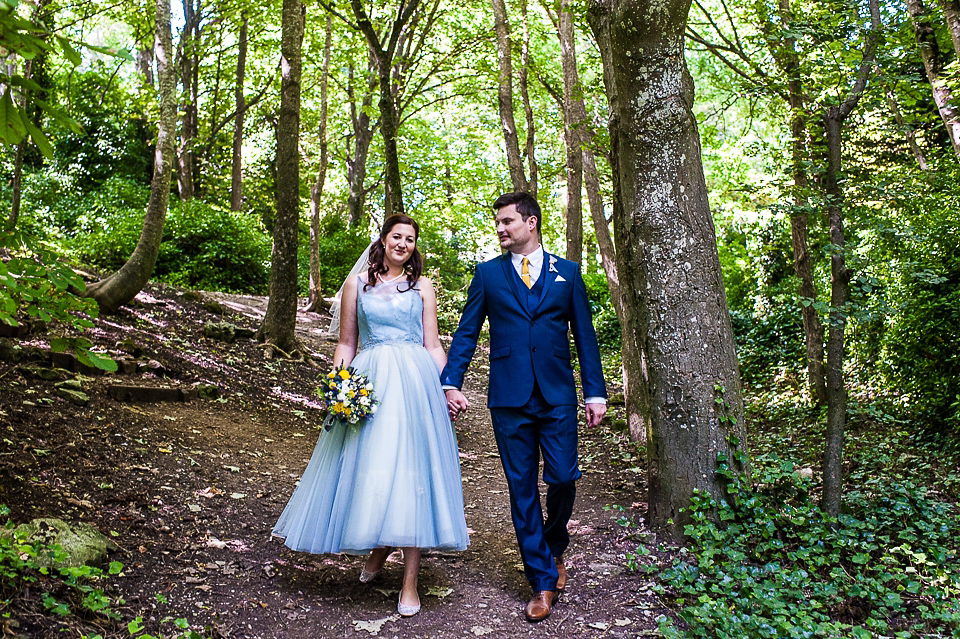 A pretty pale blue wedding dress for a nautical inspired Summer wedding by the sea. Photography by Alexandria Hall.