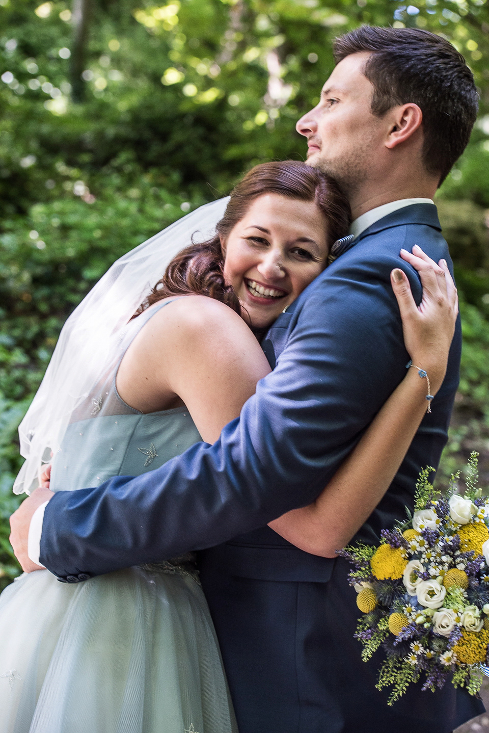 A pretty pale blue wedding dress for a nautical inspired Summer wedding by the sea. Photography by Alexandria Hall.