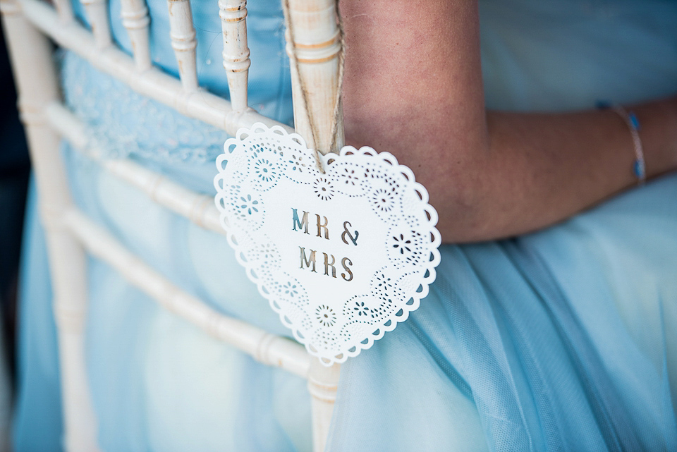 A pretty pale blue wedding dress for a nautical inspired Summer wedding by the sea. Photography by Alexandria Hall.