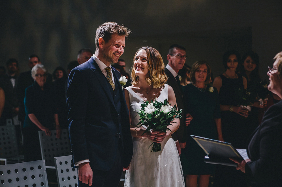 Katherine wears a Charlie Brear gown for her wedding at the Baltic Gateshead. Photography by The Twins.