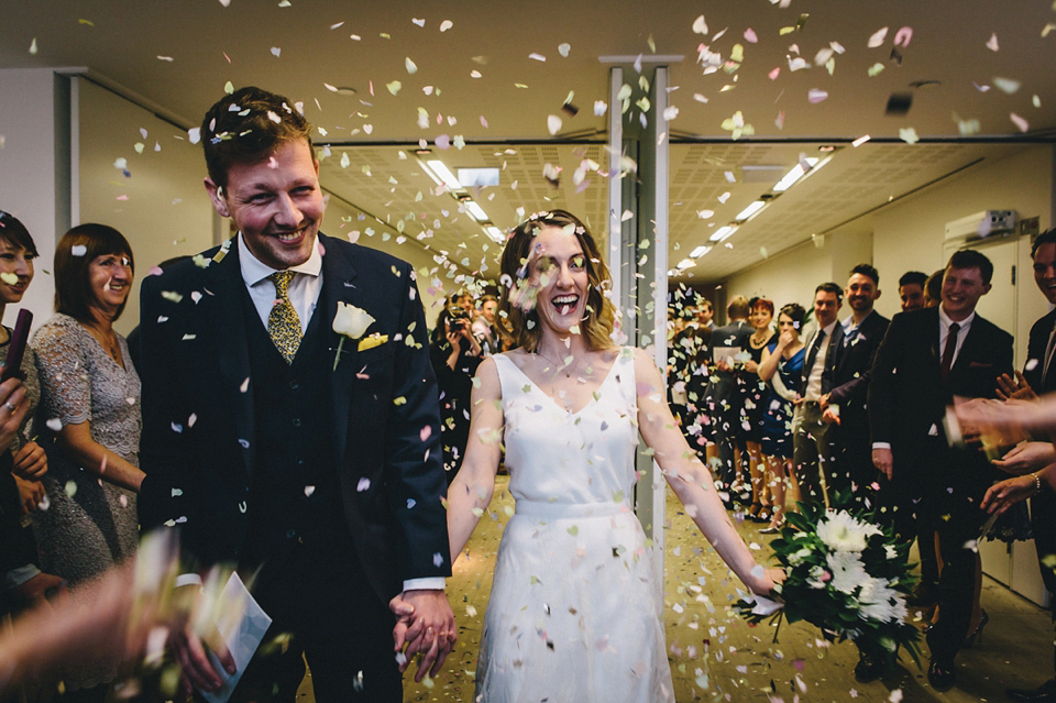 Katherine wears a Charlie Brear gown for her wedding at the Baltic Gateshead. Photography by The Twins.