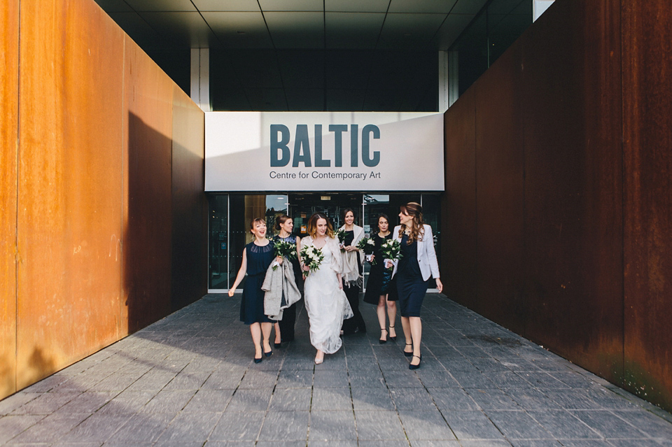 Katherine wears a Charlie Brear gown for her wedding at the Baltic Gateshead. Photography by The Twins.