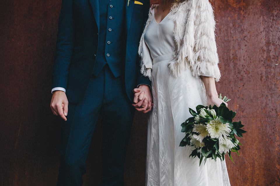 Katherine wears a Charlie Brear gown for her wedding at the Baltic Gateshead. Photography by The Twins.