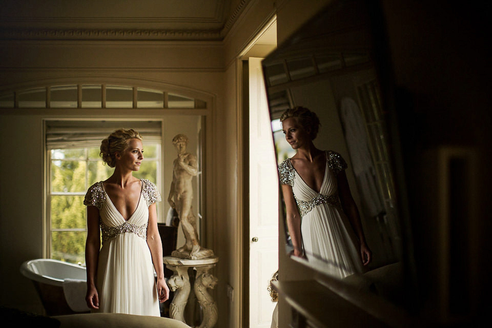 A Jenny Packham dress for an elegant black tie wedding at Aynhoe Park. Photography by Matt Parry.