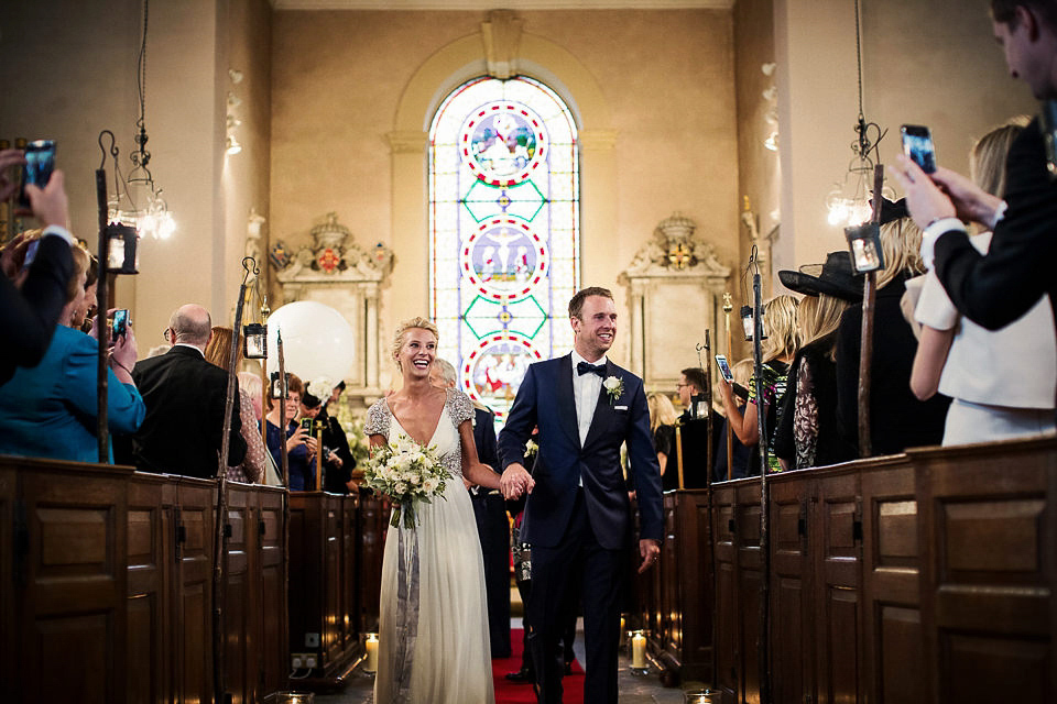 A Jenny Packham dress for an elegant black tie wedding at Aynhoe Park. Photography by Matt Parry.