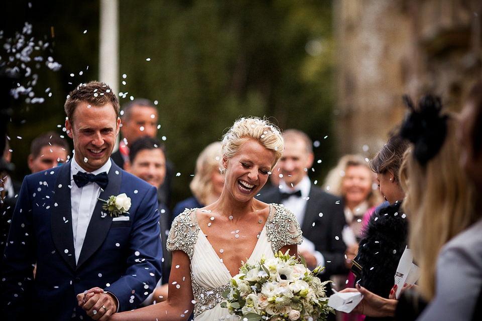 A Jenny Packham dress for an elegant black tie wedding at Aynhoe Park. Photography by Matt Parry.