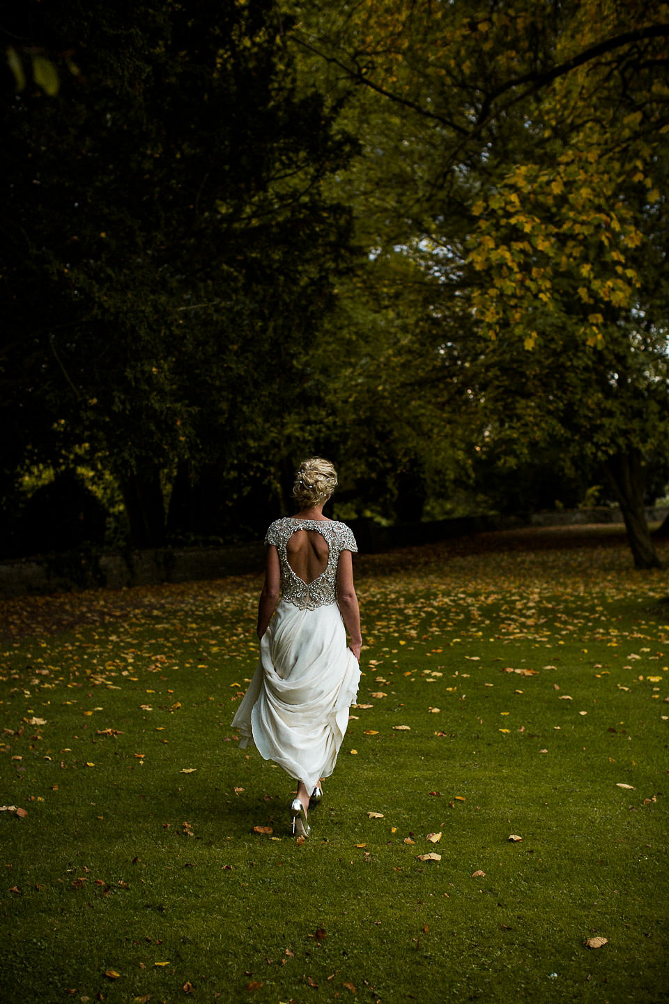 A Jenny Packham dress for an elegant black tie wedding at Aynhoe Park. Photography by Matt Parry.