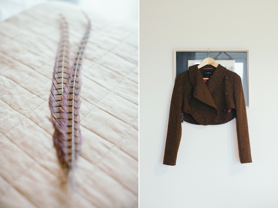 A tweed jacket and feathers in her hair for a boho bride and her eclectic woodland wedding. Images by Mirrorbox Photography.