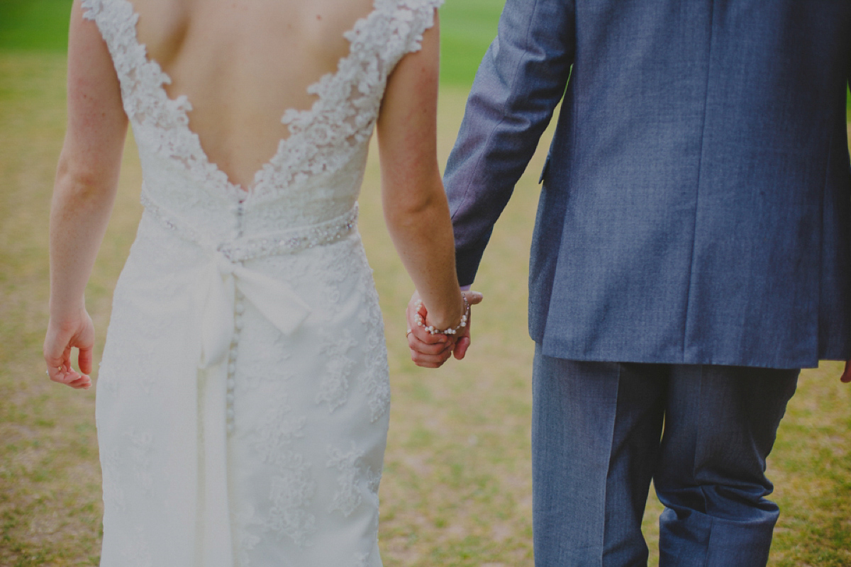 Lucy wore a Mori Lee gown for her romantic Summer wedding. Photography by Loveseen.