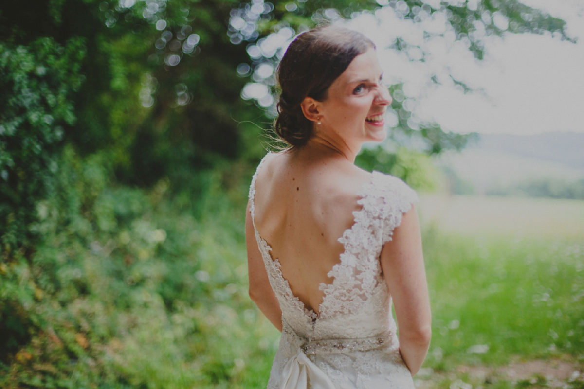 Lucy wore a Mori Lee gown for her romantic Summer wedding. Photography by Loveseen.