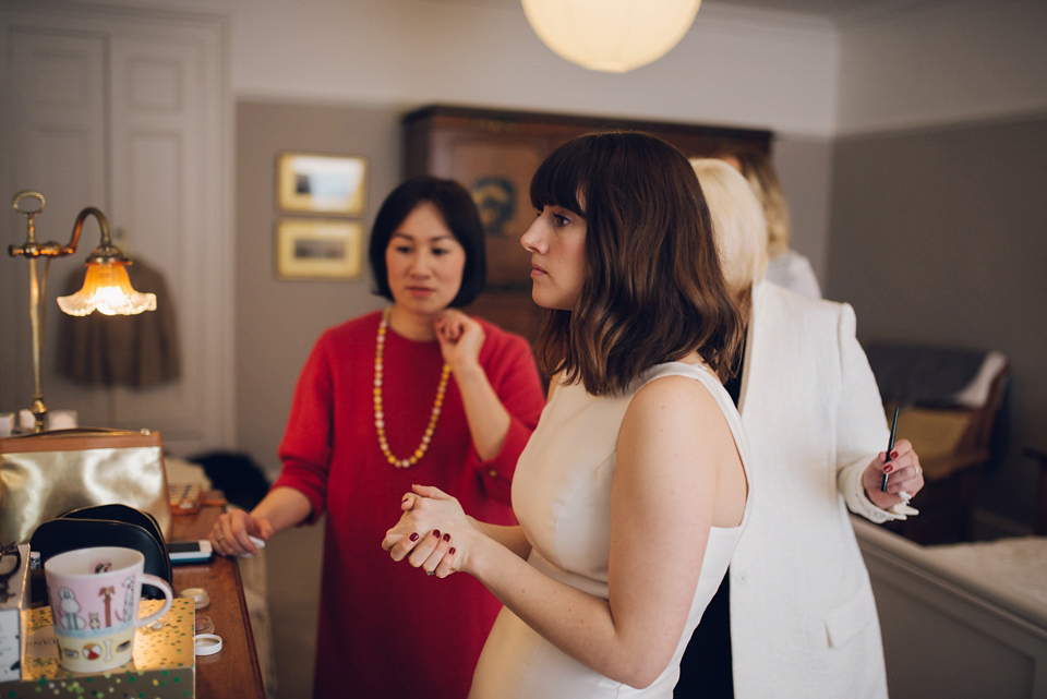 Two ceremonies and a second hand dress for a relaxed and informal family garden wedding. Photography by Dan Walker. Two ceremonies and a second hand dress for a relaxed and informal family garden wedding. Photography by Dan Walker.