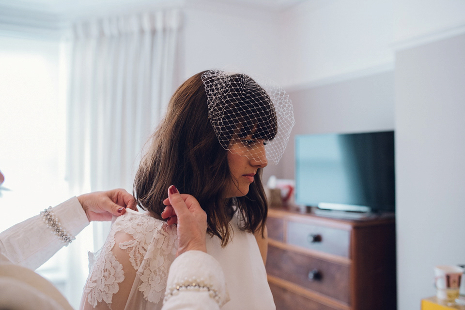 Two ceremonies and a second hand dress for a relaxed and informal family garden wedding. Photography by Dan Walker.