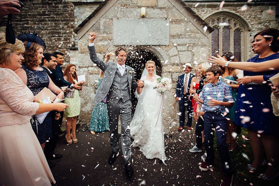 A Suzanne Neville gown for a relaxed and elegant garden wedding. Styled by Blue Fizz events. A Suzanne Neville gown for a relaxed and elegant garden wedding. Styled by Blue Fizz events.
