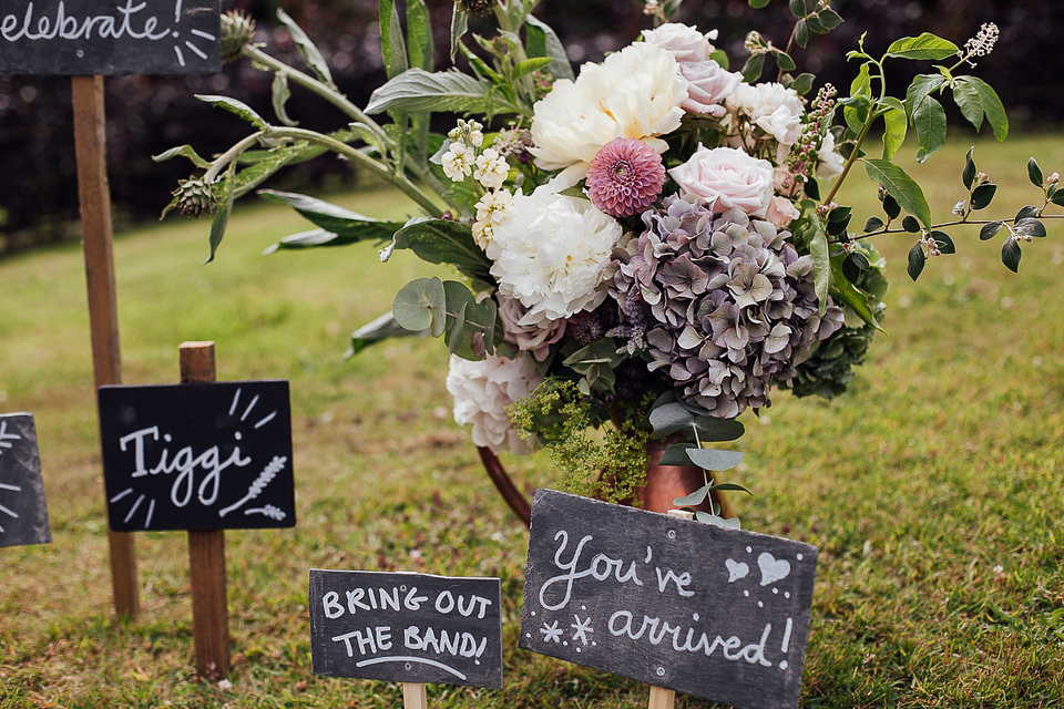 A Suzanne Neville gown for a relaxed and elegant garden wedding. Styled by Blue Fizz events. A Suzanne Neville gown for a relaxed and elegant garden wedding. Styled by Blue Fizz events.
