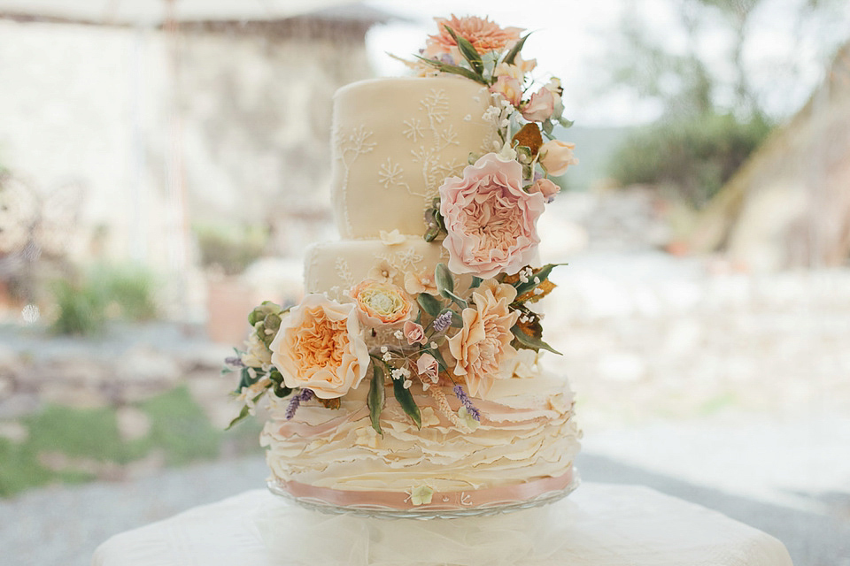 A Suzanne Neville gown for a relaxed and elegant garden wedding. Styled by Blue Fizz events. A Suzanne Neville gown for a relaxed and elegant garden wedding. Styled by Blue Fizz events.