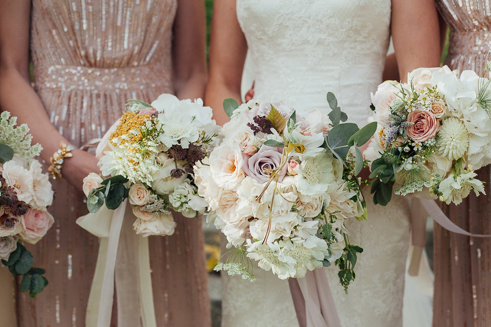 A Suzanne Neville gown for a relaxed and elegant garden wedding. Styled by Blue Fizz events. A Suzanne Neville gown for a relaxed and elegant garden wedding. Styled by Blue Fizz events.
