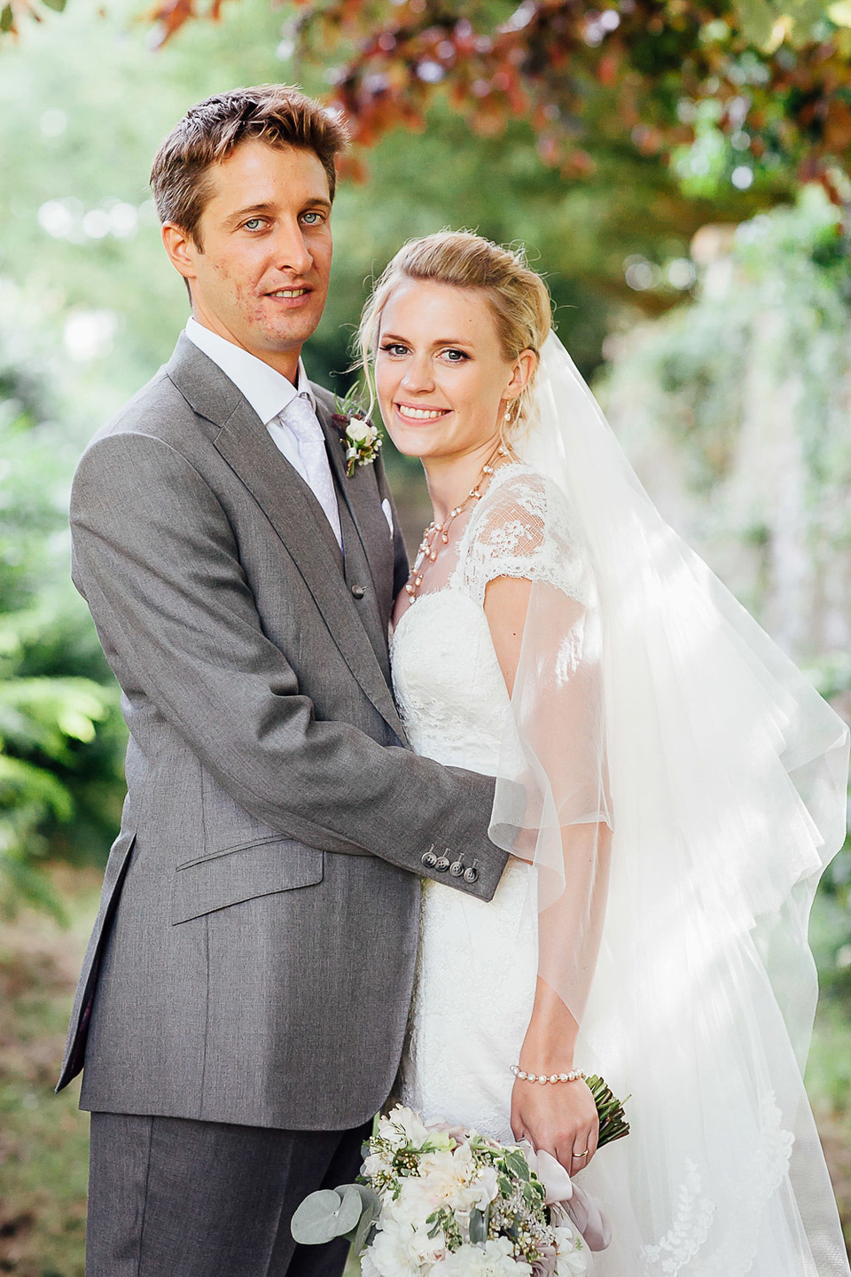 A Suzanne Neville gown for a relaxed and elegant garden wedding. Styled by Blue Fizz events. A Suzanne Neville gown for a relaxed and elegant garden wedding. Styled by Blue Fizz events.