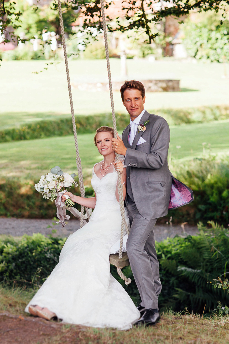 A Suzanne Neville gown for a relaxed and elegant garden wedding. Styled by Blue Fizz events. A Suzanne Neville gown for a relaxed and elegant garden wedding. Styled by Blue Fizz events.