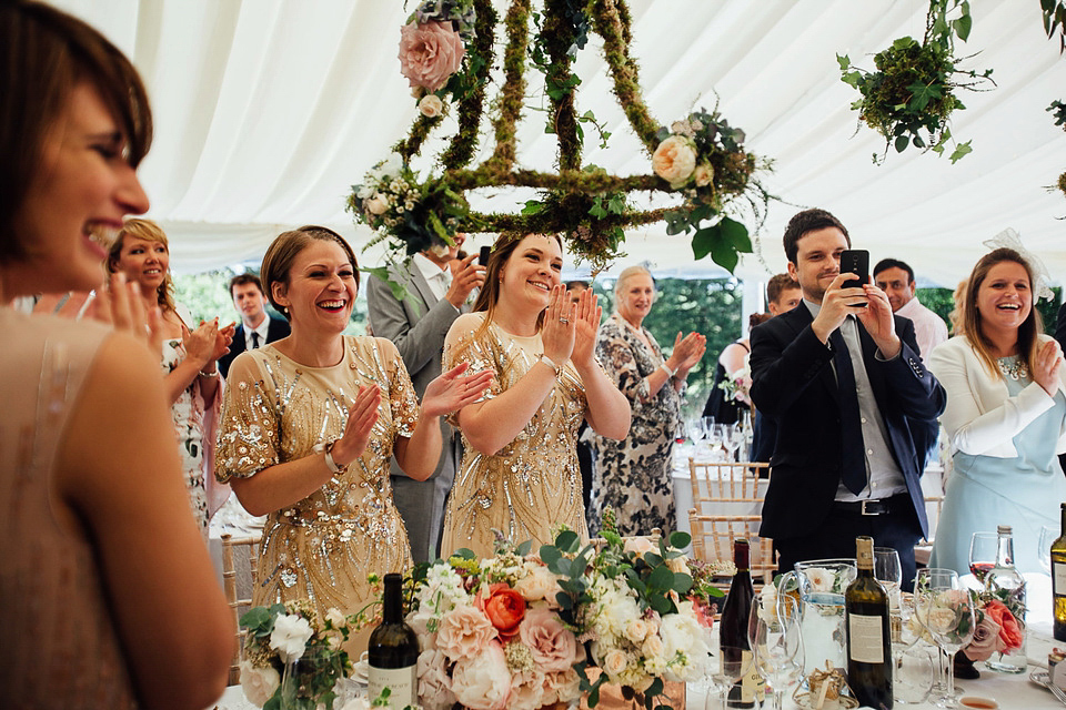 A Suzanne Neville gown for a relaxed and elegant garden wedding. Styled by Blue Fizz events. A Suzanne Neville gown for a relaxed and elegant garden wedding. Styled by Blue Fizz events.