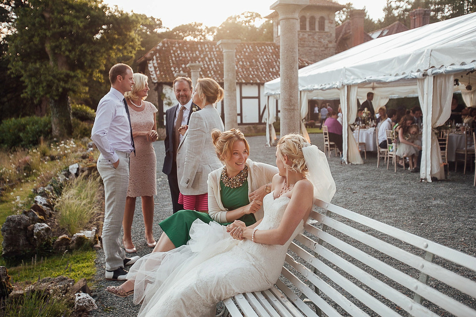 A Suzanne Neville gown for a relaxed and elegant garden wedding. Styled by Blue Fizz events. A Suzanne Neville gown for a relaxed and elegant garden wedding. Styled by Blue Fizz events.