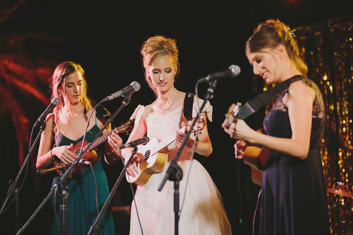 Bride Noga wore a vintage wedding dress for her modern festival wedding in the desert. Images by Echoes & Wildhearts Photography.