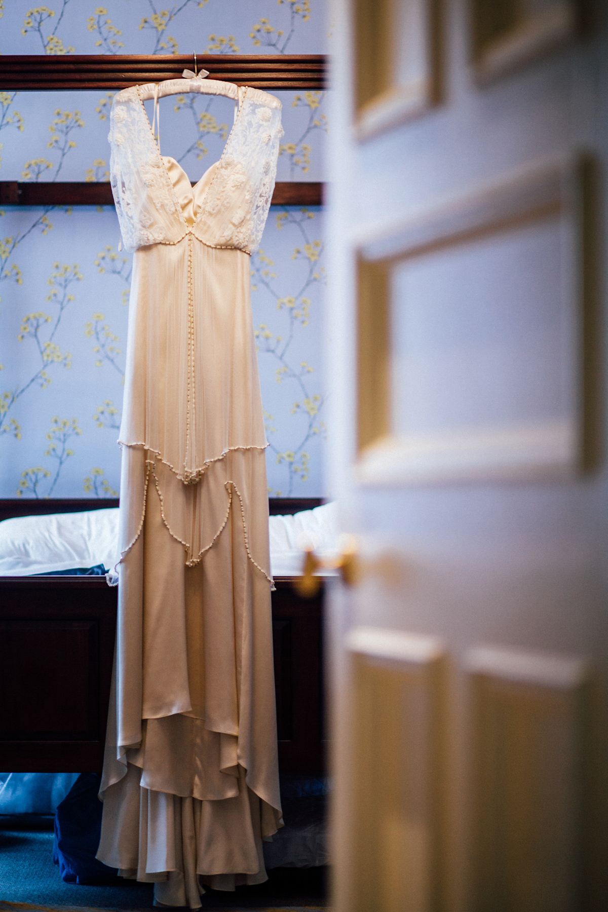 The bride wore a Catherine Deane gown for her Autumn wedding in Edinburgh. Photography by Carley Buick.