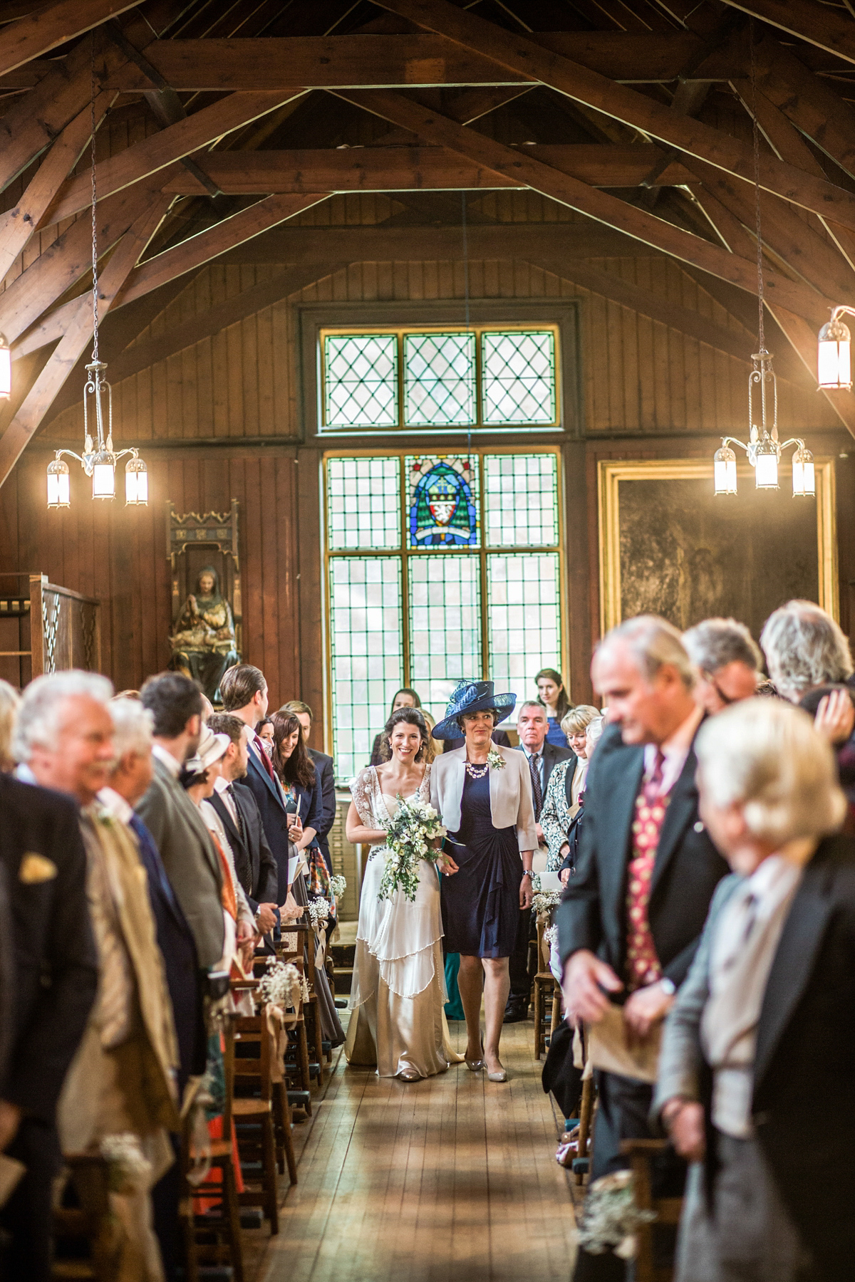 The bride wore a Catherine Deane gown for her Autumn wedding in Edinburgh. Photography by Carley Buick.