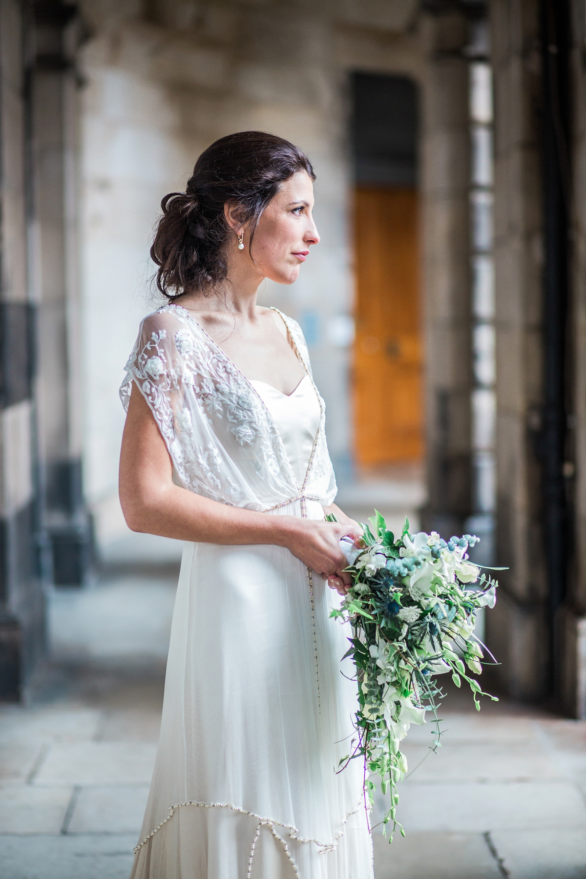 The bride wore a Catherine Deane gown for her Autumn wedding in Edinburgh. Photography by Carley Buick.