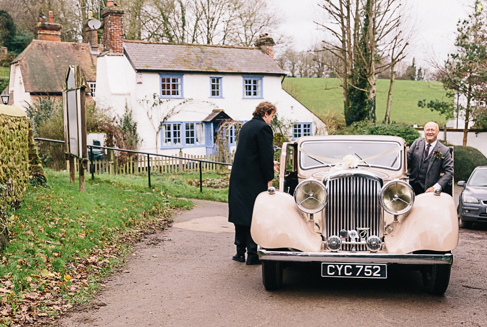 A Suzanne Neville gown for a 1940's Goodwood Vintage inspired winter wedding. Images by Eclection Photography.