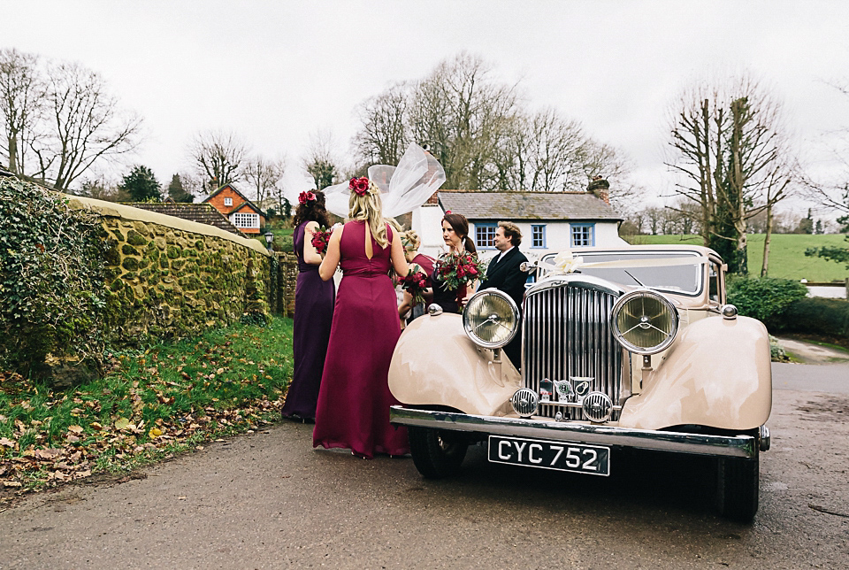 A Suzanne Neville gown for a 1940's Goodwood Vintage inspired winter wedding. Images by Eclection Photography.