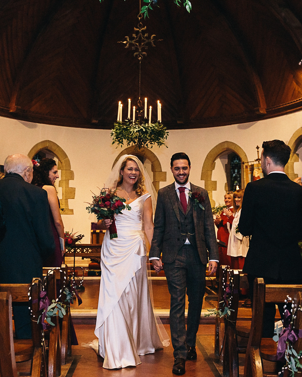 A Suzanne Neville gown for a 1940's Goodwood Vintage inspired winter wedding. Images by Eclection Photography.