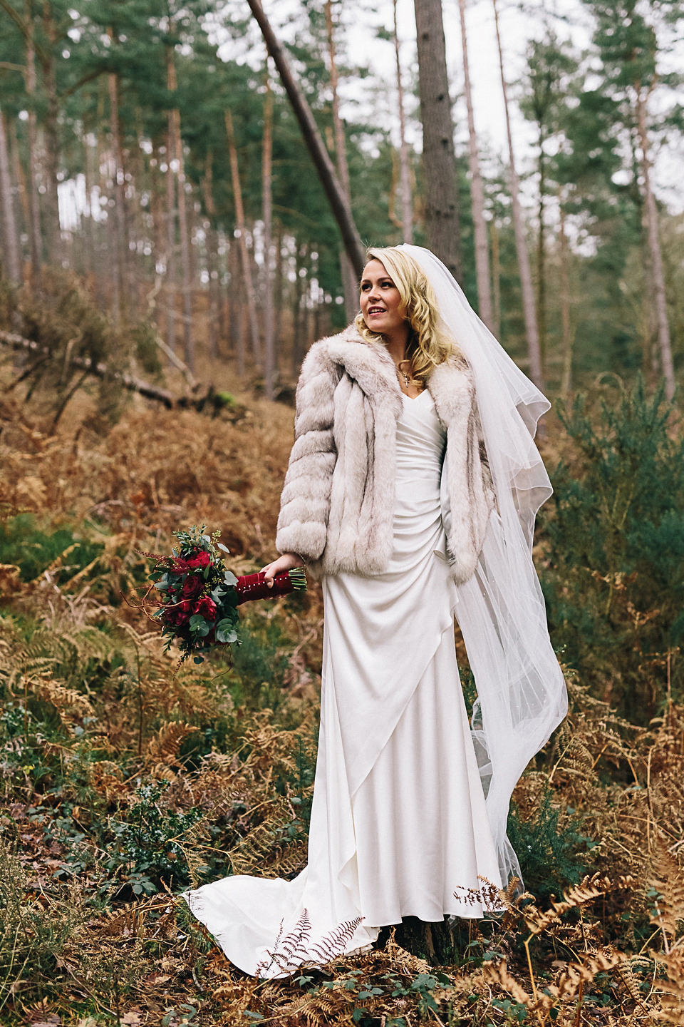 A Suzanne Neville gown for a 1940's Goodwood Vintage inspired winter wedding. Images by Eclection Photography.