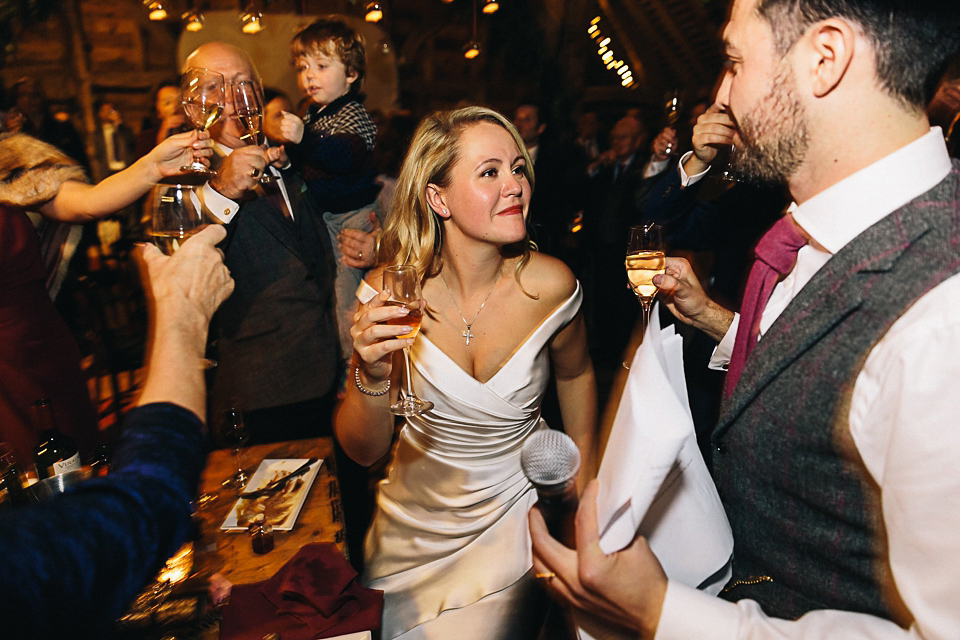 A Suzanne Neville gown for a 1940's Goodwood Vintage inspired winter wedding. Images by Eclection Photography.