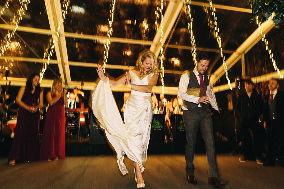 A Suzanne Neville gown for a 1940's Goodwood Vintage inspired winter wedding. Images by Eclection Photography.