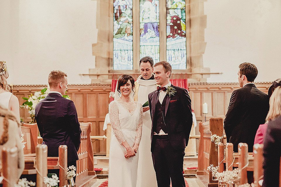 Bride Olivia wore a Charlie Brear gown for her Papakata teepee wedding on New Years Eve. The coupled tied the knot in the bride's mothers garden. Photography by Steve Rooney.