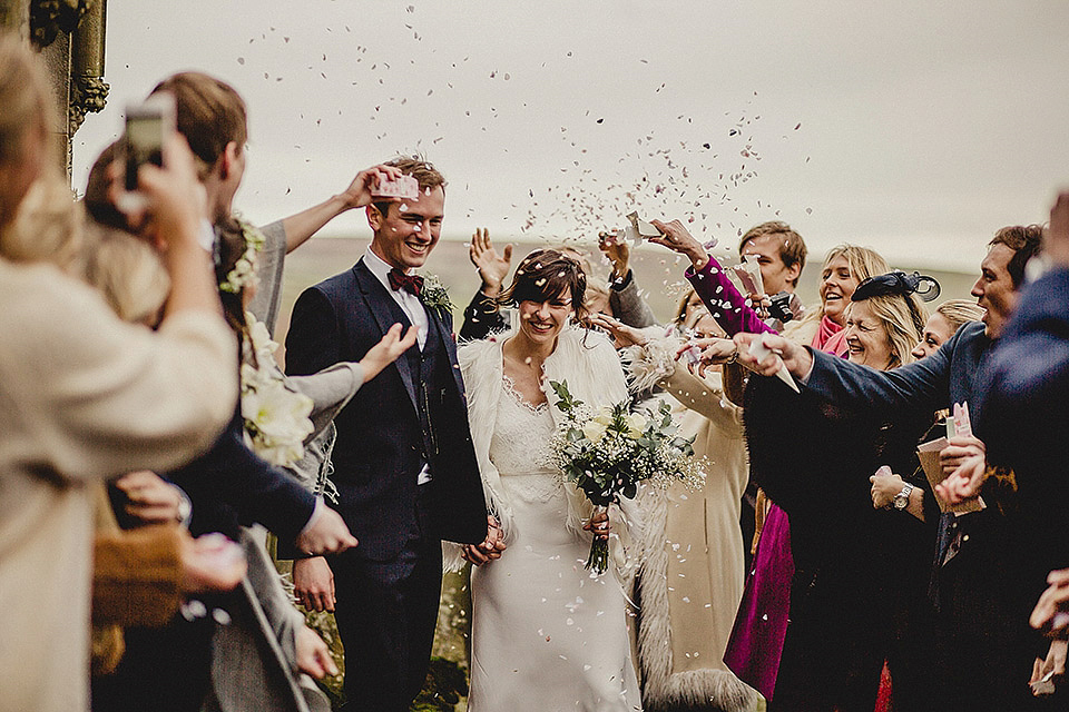 Bride Olivia wore a Charlie Brear gown for her Papakata teepee wedding on New Years Eve. The coupled tied the knot in the bride's mothers garden. Photography by Steve Rooney.