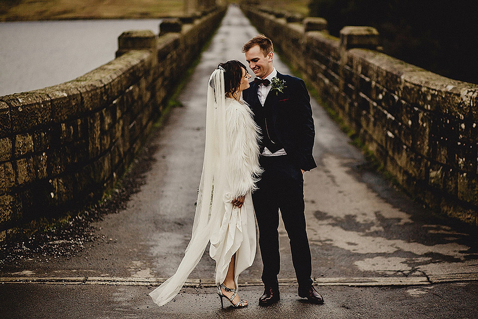 Bride Olivia wore a Charlie Brear gown for her Papakata teepee wedding on New Years Eve. The coupled tied the knot in the bride's mothers garden. Photography by Steve Rooney.