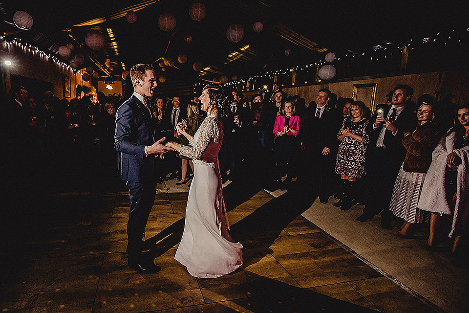 Bride Olivia wore a Charlie Brear gown for her Papakata teepee wedding on New Years Eve. The coupled tied the knot in the bride's mothers garden. Photography by Steve Rooney.