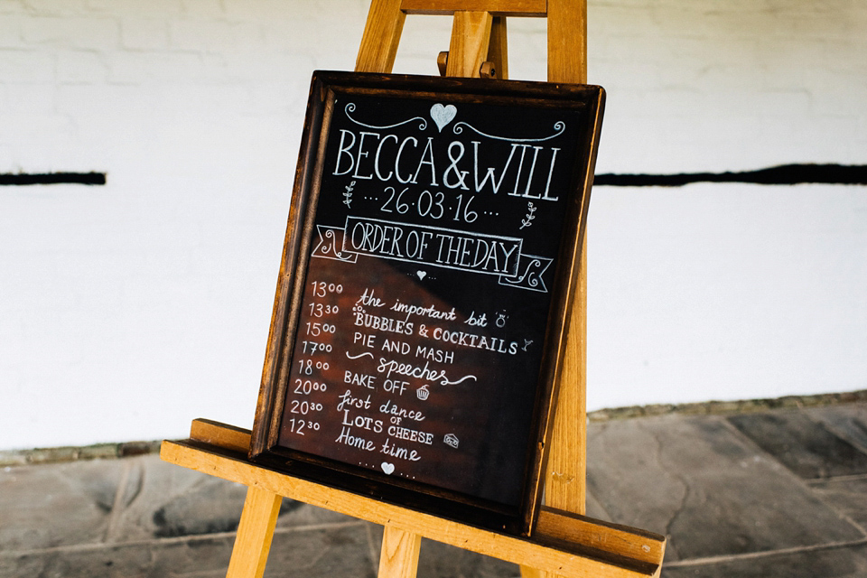 A rainy day, Spring barn wedding at Lillibrooke Manor. The bride wore Mori Lee. Photography by Ed Godden.