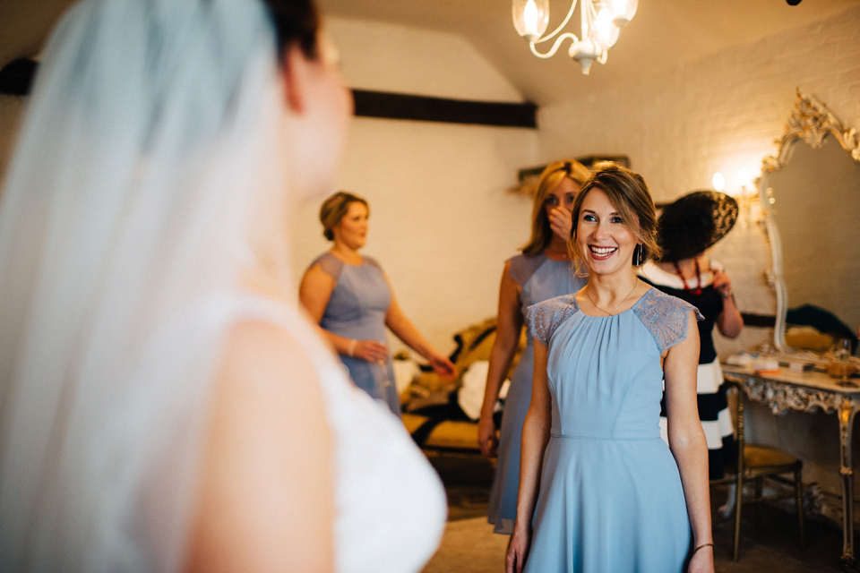 A rainy day, Spring barn wedding at Lillibrooke Manor. The bride wore Mori Lee. Photography by Ed Godden.