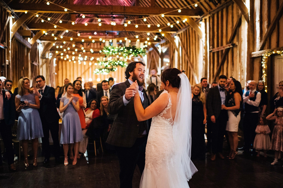 A rainy day, Spring barn wedding at Lillibrooke Manor. The bride wore Mori Lee. Photography by Ed Godden.