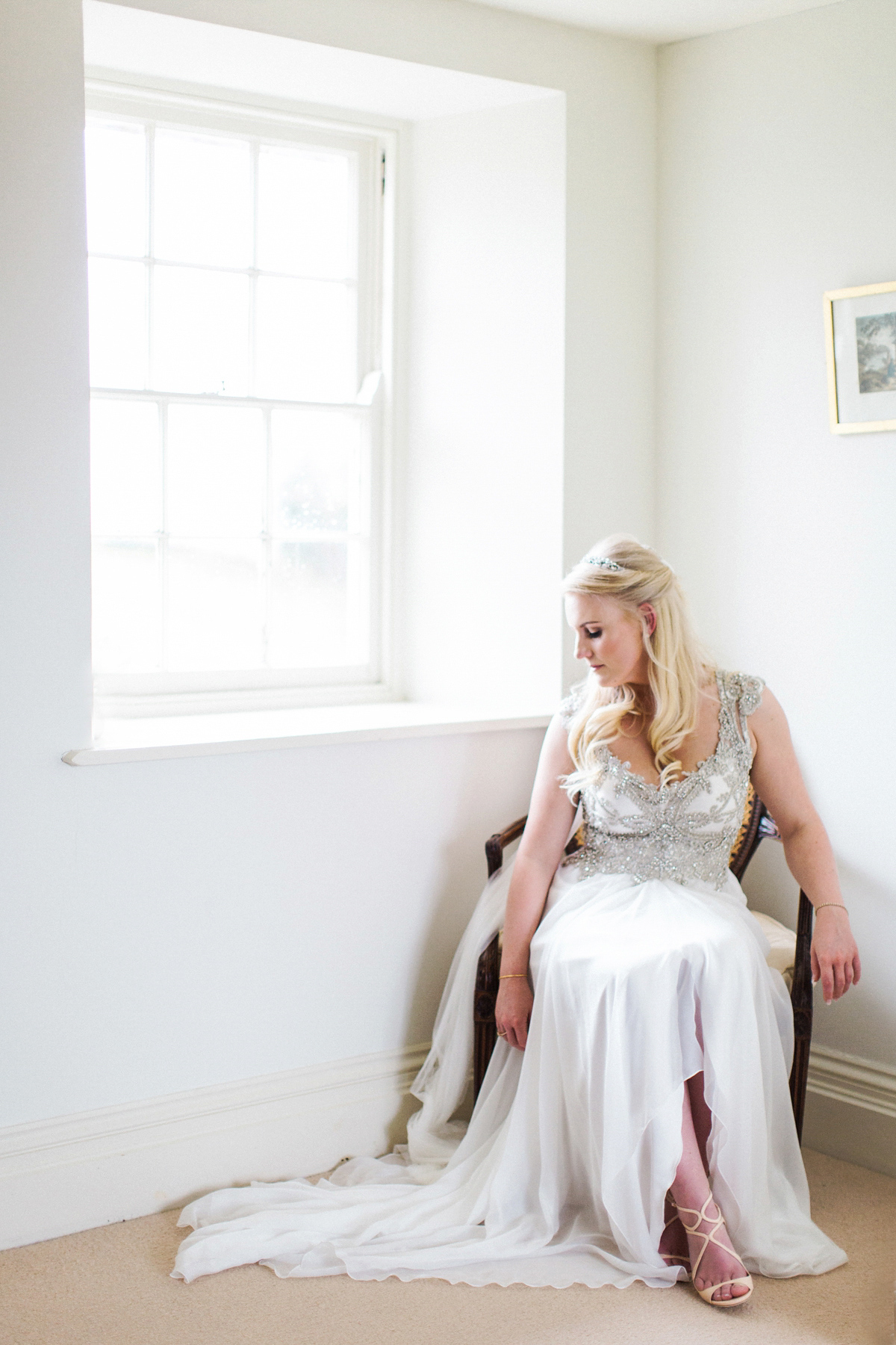 The bride wears Anna Campbell for her winter wedding at Dewsall Court. Fine Art wedding photography by Melissa Beattie.