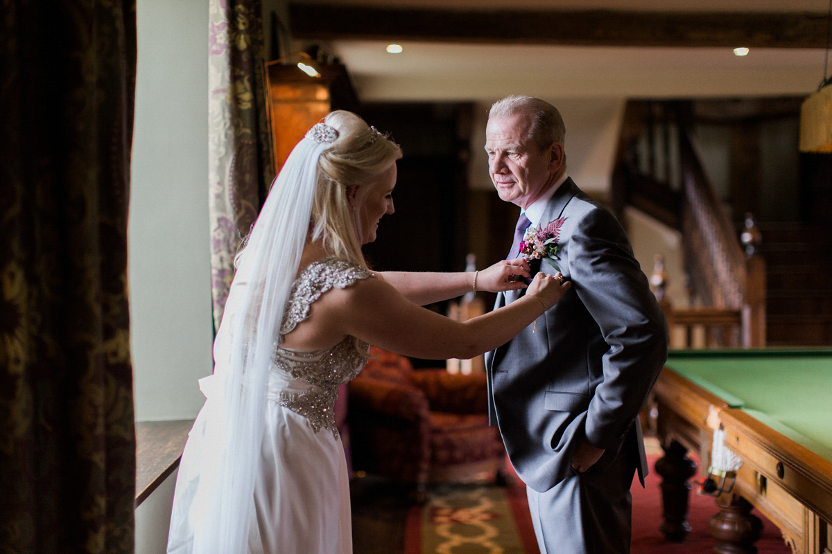 The bride wears Anna Campbell for her winter wedding at Dewsall Court. Fine Art wedding photography by Melissa Beattie.