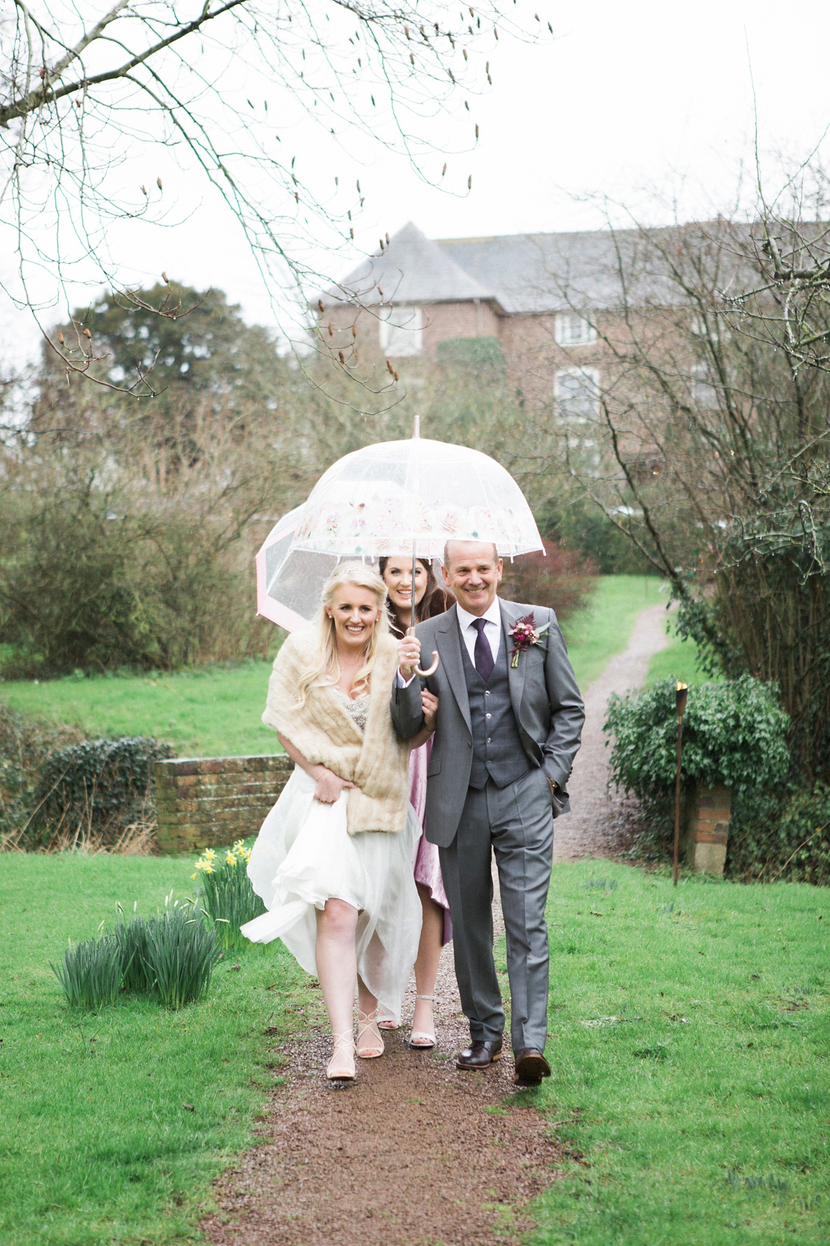 The bride wears Anna Campbell for her winter wedding at Dewsall Court. Fine Art wedding photography by Melissa Beattie.