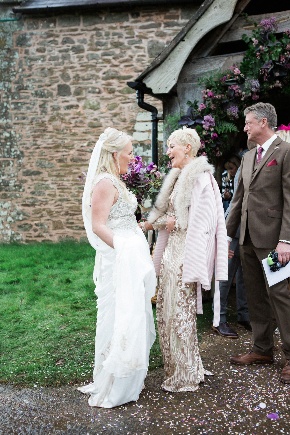 The bride wears Anna Campbell for her winter wedding at Dewsall Court. Fine Art wedding photography by Melissa Beattie.