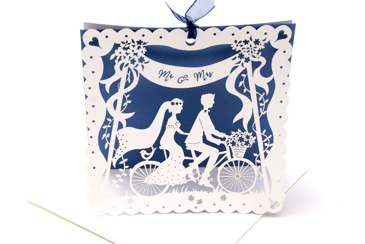 Lasercut wedding stationery by Hummingbird Card Company.