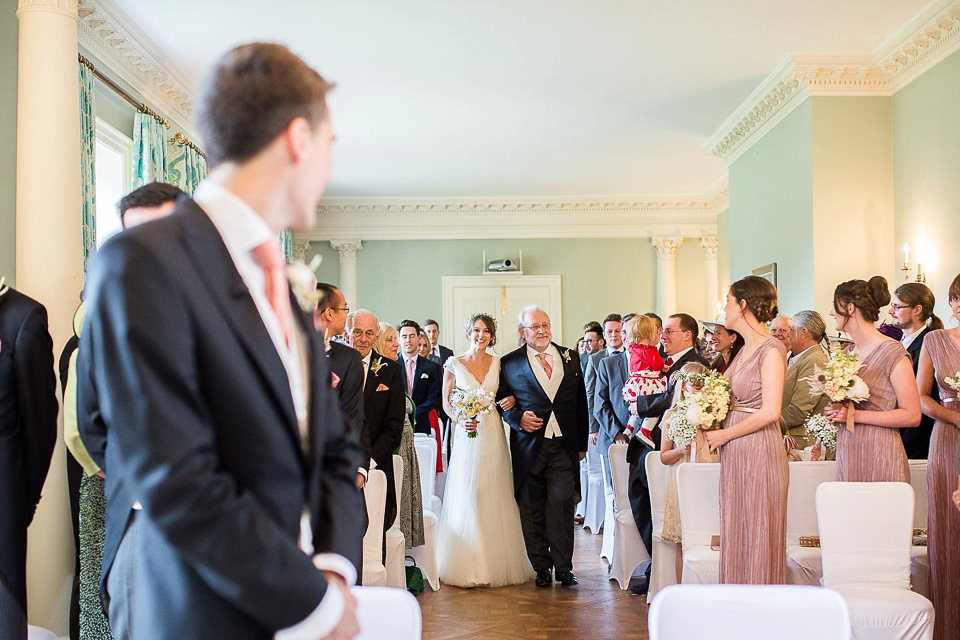 Sophie wears a Lusan Mandongus gown for her relaxed English country garden wedding. Images by Ayesha Photography.