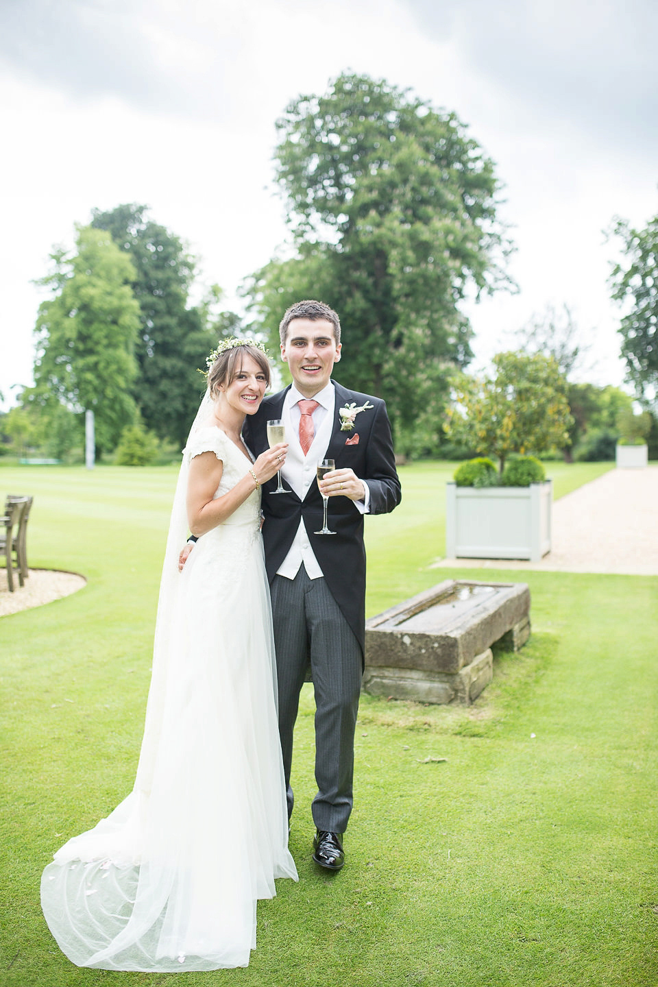 Sophie wears a Lusan Mandongus gown for her relaxed English country garden wedding. Images by Ayesha Photography.