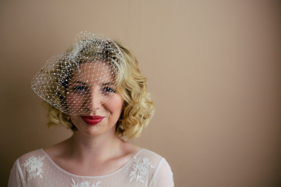 Sarah wears a 1950's inspired dress for her rustic wedding at Danby Castle in North Yorkshire. Photography by Stott & Atkinson.